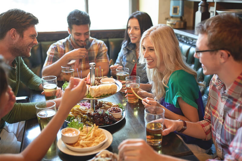 group of friends enjoying a dining experience